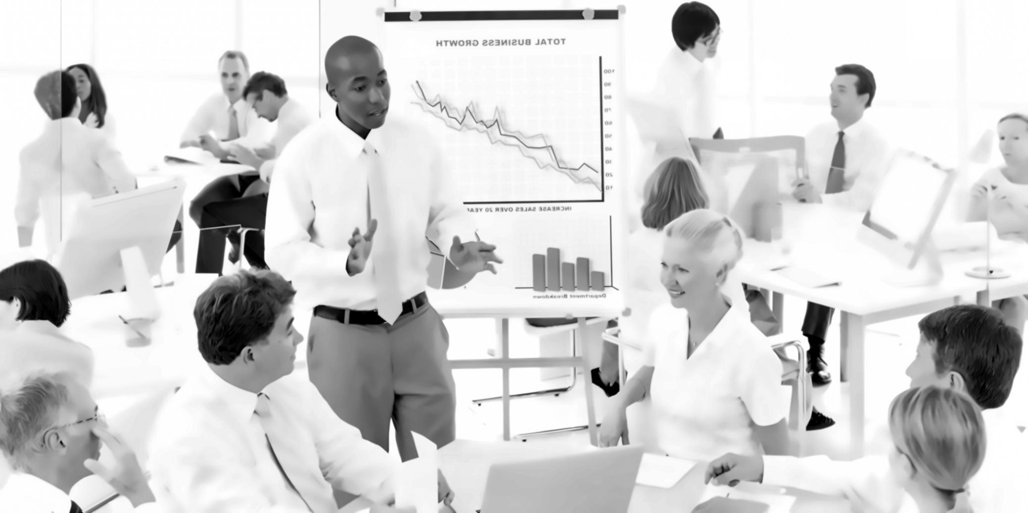 Organized study environment with financial documents, laptop, and learning materials arranged on desk